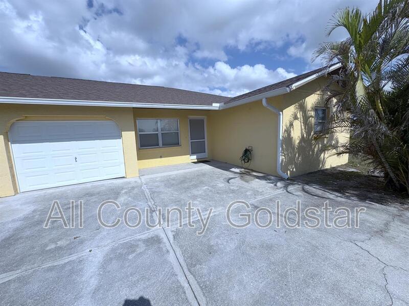 134 Boundary Blvd in Rotonda West, FL - Building Photo