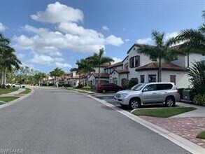 15148 Palmer Lake Cir-Unit -201 in Naples, FL - Building Photo - Building Photo