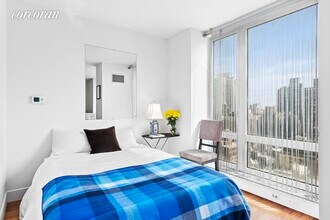 250 E 53rd St-Unit -: 2203 in New York, NY - Building Photo - Building Photo