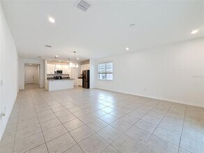 418 Quayside Ave in Mascotte, FL - Building Photo - Building Photo