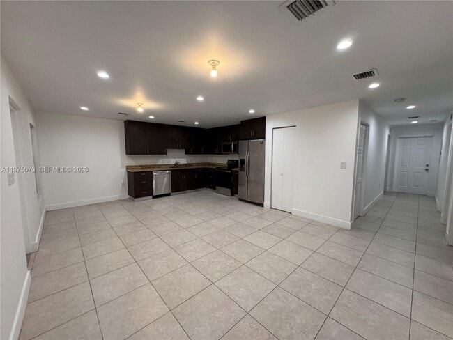 property at 605 NW 3rd Ave