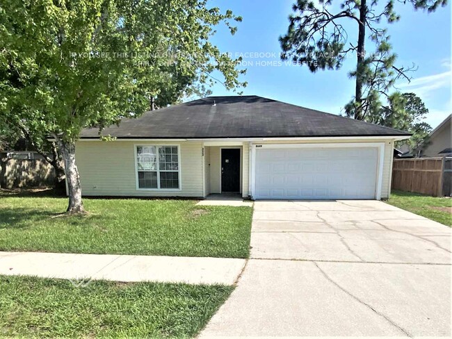 property at 8649 Collins Ridge Blvd S