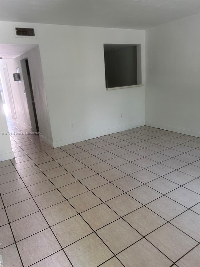 property at 14204 NE 3rd Ct