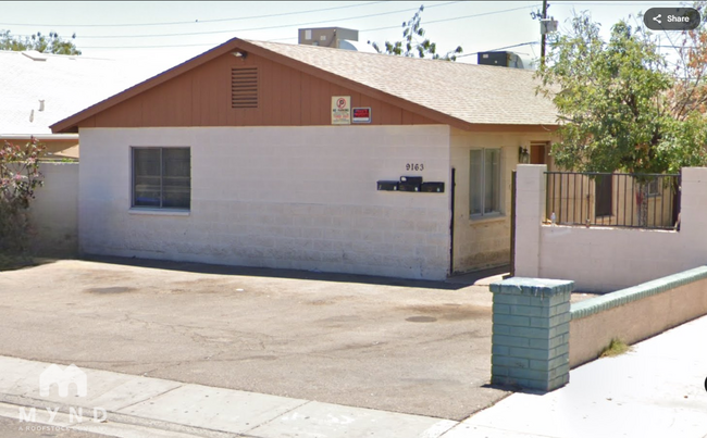 property at 9163 W Washington St