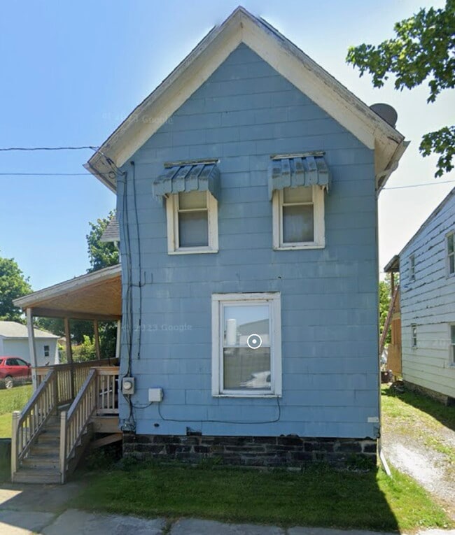 property at 610 E 3rd St