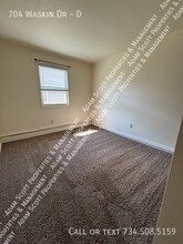 704 Waskin Dr-Unit -D in Tecumseh, MI - Building Photo - Building Photo