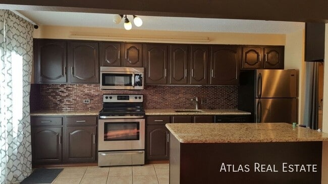 6406 E Bates Ave in Denver, CO - Building Photo - Building Photo
