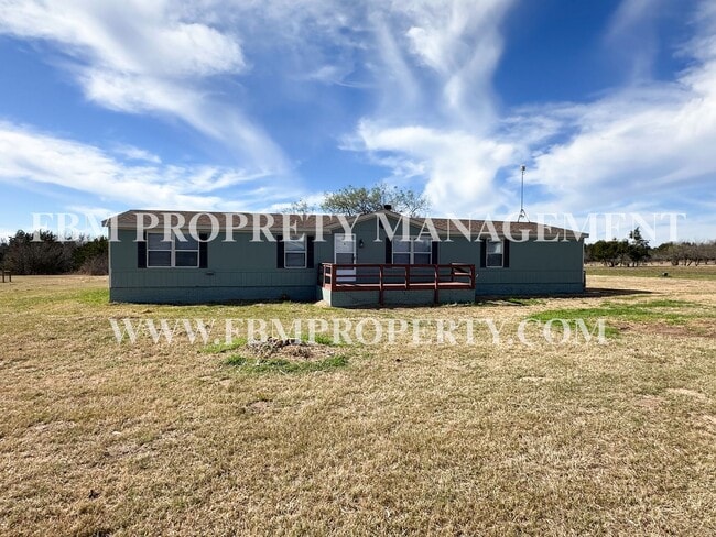 property at 135 SE County Rd 3144