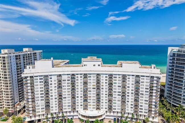property at 6039 Collins Ave
