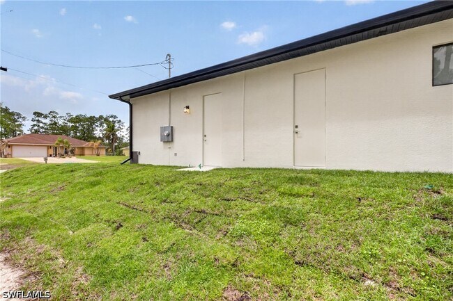 1204 Moore Ave in Lehigh Acres, FL - Building Photo - Building Photo