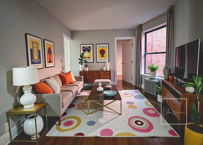 property at 411 E 118th St