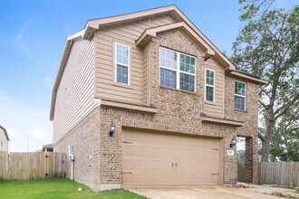 12083 Quartersawn Ln in Pinehurst, TX - Building Photo - Building Photo