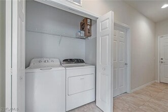 15133 Reef Ln in Bonita Springs, FL - Foto de edificio - Building Photo