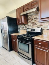 1301 S Rimpau Blvd, Unit Duplex in Los Angeles, CA - Building Photo - Building Photo