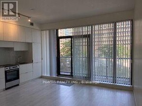 159-159 Dundas St E in Toronto, ON - Building Photo - Building Photo