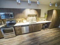 Building Photo - Highland Place Apartamentos in Denver, Colorado