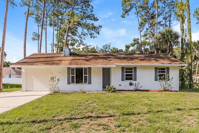 property at 8403 Deland Ave