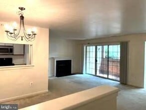 12 Rain Flower Path, Unit 104 in Sparks, MD - Building Photo - Building Photo