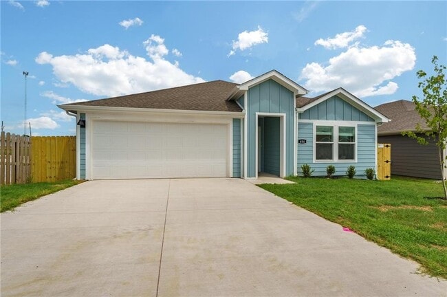 property at 404 NW Granny Smith St
