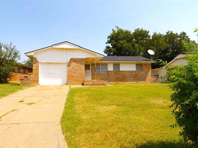 property at 715 SW Ranch Oak Blvd