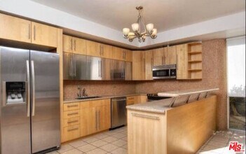 318 N Maple Dr-Unit -C106 in Beverly Hills, CA - Foto de edificio - Building Photo