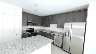 1602 Fan Palm Dr in Davenport, FL - Building Photo - Building Photo