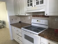 450 Golden Isles Dr, Unit 1G photo'