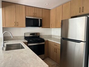 1517 Armacost Ave, Unit 102 in Los Angeles, CA - Building Photo - Building Photo