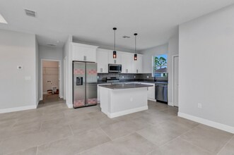 8489 Topeka Cir in Port Charlotte, FL - Building Photo - Building Photo