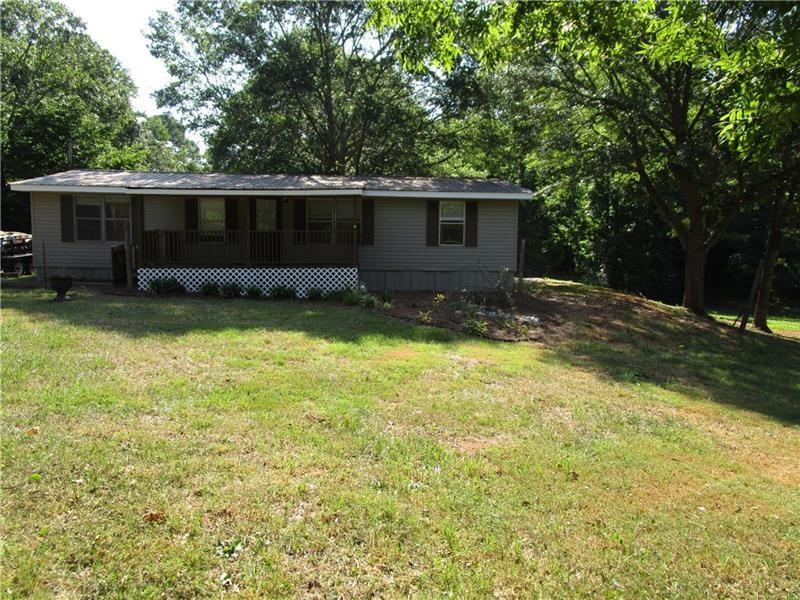 7136 Jake Kemp Rd in Murrayville, GA - Building Photo