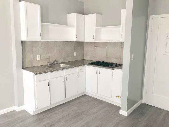 1121 S Norton Ave-Unit -104 in Los Angeles, CA - Building Photo - Building Photo