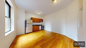 201-205-205 W 11th St in New York, NY - Building Photo