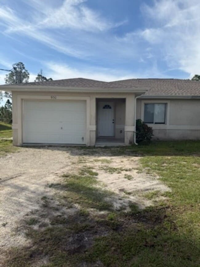 930 Ainsworth St W in Lehigh Acres, FL - Building Photo - Building Photo