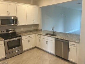 13981 Winding Cedar Wy in Miromar Lakes, FL - Building Photo - Building Photo