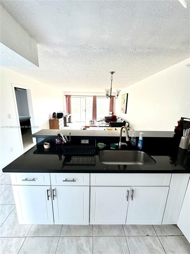 8300 Sands Point Blvd in Tamarac, FL - Building Photo - Building Photo