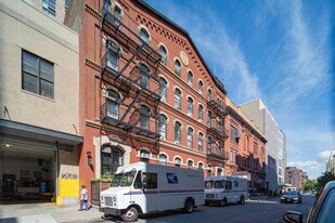 113-117 E 11th St in New York, NY - Building Photo