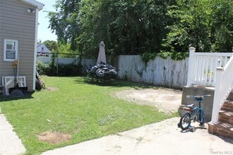 1075 Harrison St in Uniondale, NY - Building Photo - Building Photo