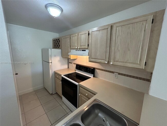 property at 1725 Palm Cove Blvd