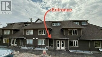 11 Tree Tops Ln in Huntsville, ON - Building Photo