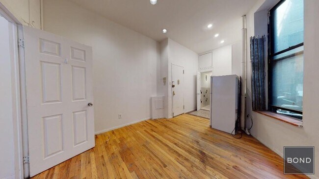 property at 214 E 10th St