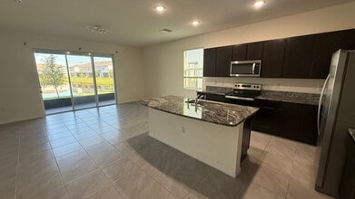 32474 Turtle Grace Lp in Wesley Chapel, FL - Building Photo - Building Photo