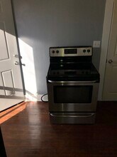 811 N Pine St, Unit #3 in Lansing, MI - Building Photo - Building Photo