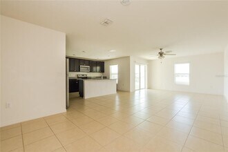 1689 Hideaway Flat St in Mascotte, FL - Building Photo - Building Photo
