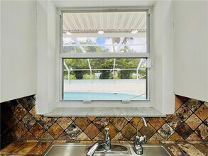 12845 S Indian River Dr in Jensen Beach, FL - Foto de edificio - Building Photo