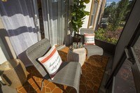 Enjoy the outdoors on your very own private, screened-in patio. - The Bentley at Maitland Apartments in Orlando, Florida