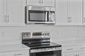 5555 Double Eagle Cir, Unit 3933 in Ave Maria, FL - Foto de edificio - Building Photo
