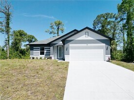 313 Hermosa Ave in Lehigh Acres, FL - Building Photo