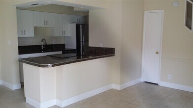 8877 NW 28th Dr in Coral Springs, FL - Building Photo - Building Photo