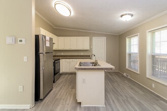 8100 Tam O'Shanter Dr in Greensboro, NC - Building Photo - Building Photo