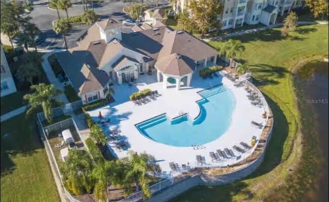 5259 Cane Island Loop, Unit 404 in Kissimmee, FL - Building Photo - Building Photo